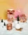 Set My Jolie Candle Les Essentielles Christmas Powdered cinnamon cu lumanare parfumata 75g + bomba de baie 100g
